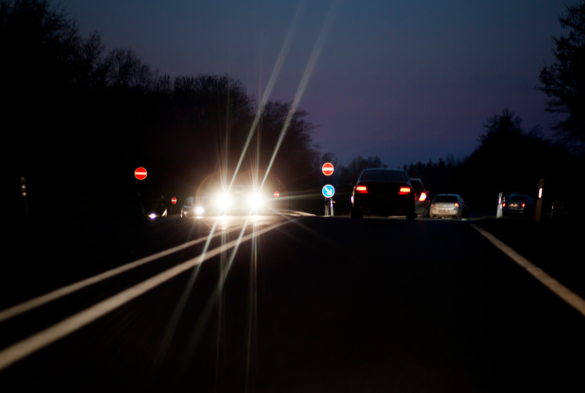 Why are car headlights so blindingly bright now?